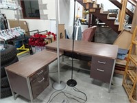 L shaped desk with two lamps