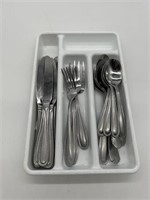 Mismatched utensils and tray