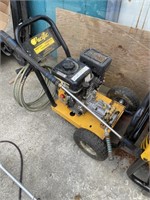 Pressure washer with wand and hose. Pacific