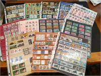 Large collection of vintage US stamps in pages