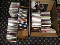 Two boxes of music CDs, mostly country