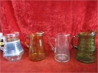 (4)Glass lemonade pitchers.
