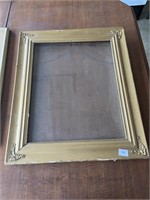 Wood frame painted Gold. Missing back 21.5x25