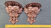 Pair cast iron shelves winged cherubs angels