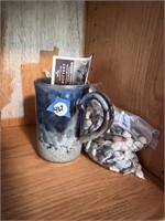 POTTERY MUG AND LITTLE ROCKS