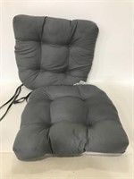 Two gray seat cushions