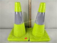 2 neon yellow traffic cones