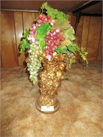 Gold cherub display with artificial grapes