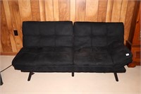 Futon; black fabric; measures approx. 70 in L