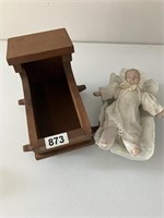 Ceramic baby doll (12.5") w/wooden cradle