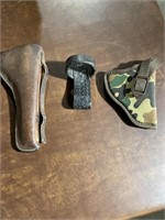 TWO LEATHER HOLSTERS CAMO HOLSTER