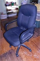 Executive office chair on casters