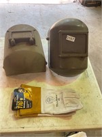 2 welding hoods, welding gloves with tags