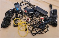 Assorted power cords and cables in one bag.
