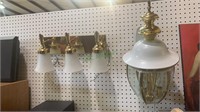 Two light fixtures - large brass and white wall