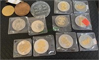10 coin medallions including two Statue of
