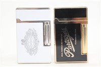 Two Collectible Partagas Lighters