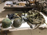 Lot GI issue gear, 2 Vietnam erra steel helmets