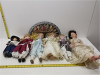doll collection on display stands