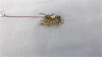 Gold nesting birds pendent