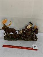 Santa on sleigh with Forest animals