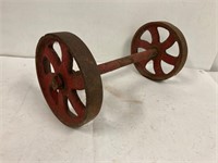 Cast iron wheels. 8” wheels. 16” across.
