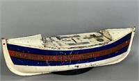 Pressed tin life boat bank ca. 1910; attributed