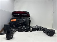Canon A-1 and Canon AV-1 35 mm camera bodies with