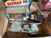 Small Flat with 3 Batman Toys