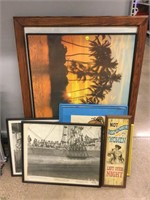 Assorted framed prints and more.
