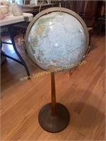 Vintage Replogle land and sea globe on stand