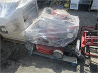 Pallet of lawn mowers