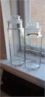 Pair of glass canisters