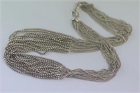 Twelve strand sterling silver beaded necklace