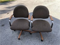 PAIR OF MCM ROLL AROUND CHAIRS.