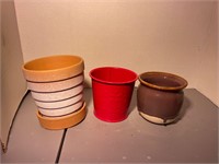 red metal, ceramic and terracotta planter pots