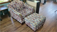 Upholstered armchair and footstool