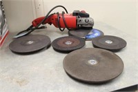 Milwaukee 9" Grinder with (4) Extra Wheels