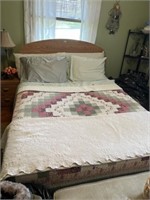 Bed with frame and linens