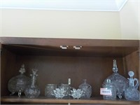 Shelf of variety of glassware