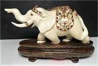 Porcelain Elephant Figurine on Wood Base
