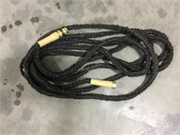 Expanding hose with brass ends