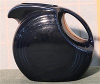 dark blue pottery pitcher