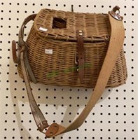 Wicker fishing creel measures 14 inches long and