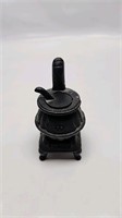 Cast iron stove ornament