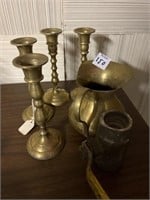 Brass candleholders, small pitcher, and stop