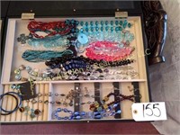 Assorted jewelry case not included