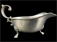 Antique pewter gravy boat, 6" long.  Curl handle