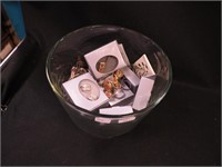 Container of costume jewelry including