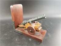 1 Bookend with a small articulating cannon